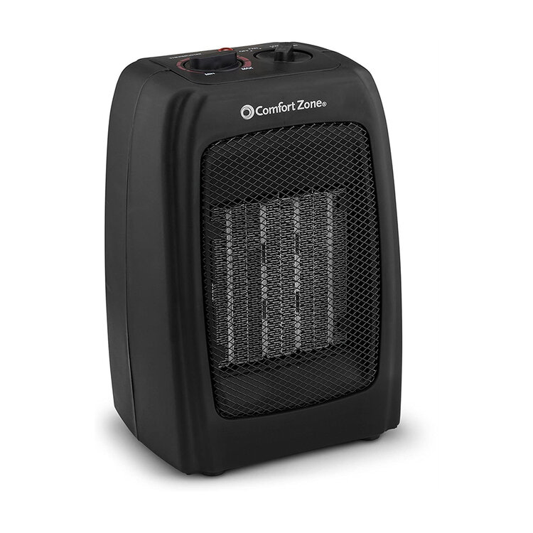 Compact black Comfort Zone space heater with adjustable thermostat and safety mesh grille for home or office heating.