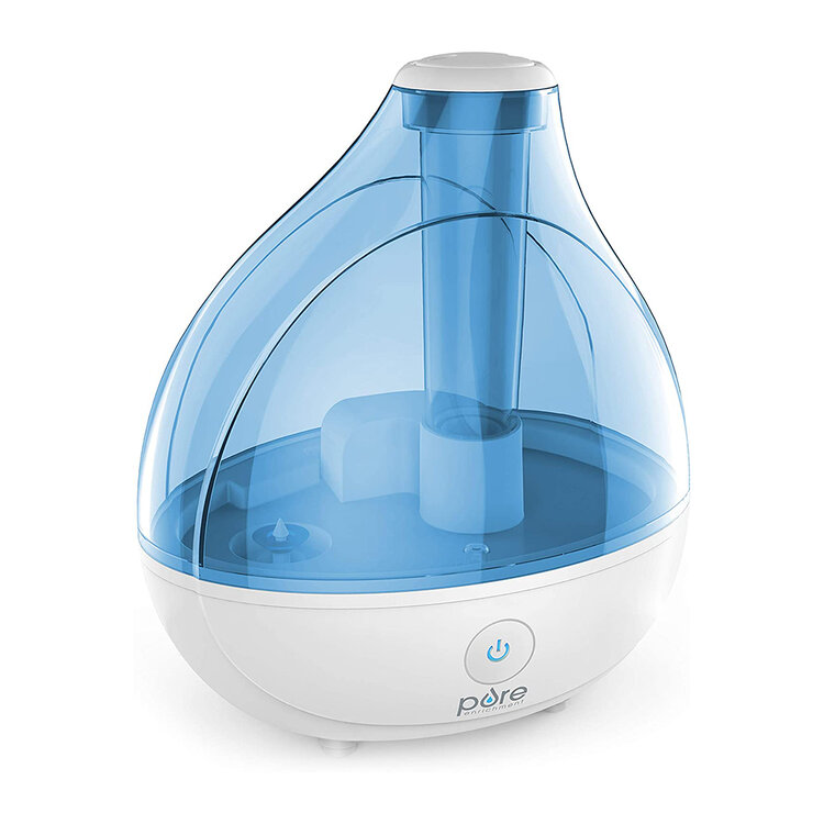 Compact Pure Enrichment ultrasonic humidifier with a blue transparent tank and single-button control for cool mist output.