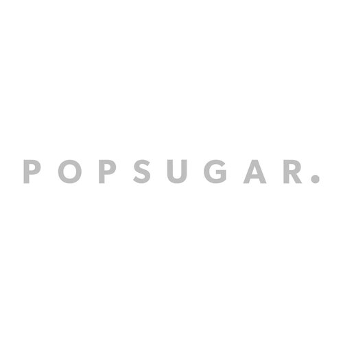 Gray POPSUGAR. logo in clean, bold, all-caps sans-serif font on a white background.
