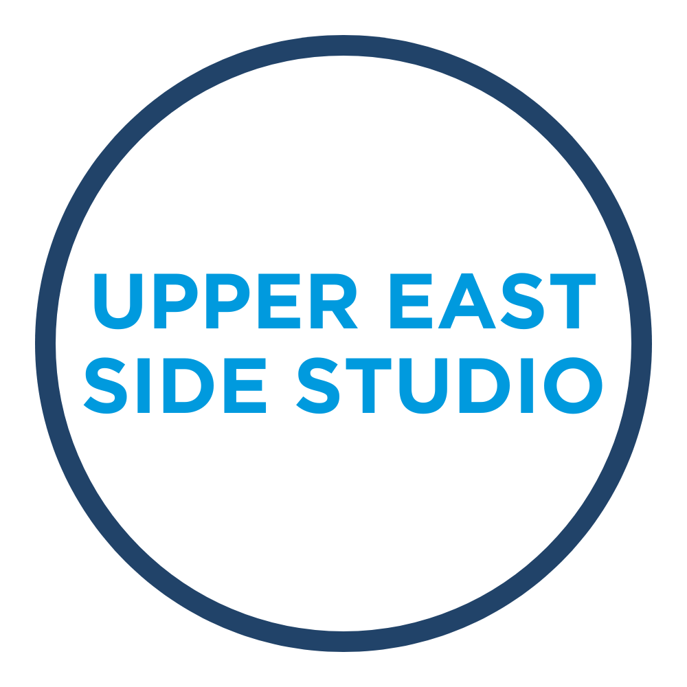 Blue letters UES centered inside a dark blue circle on a white background. This Link will open in new tab.